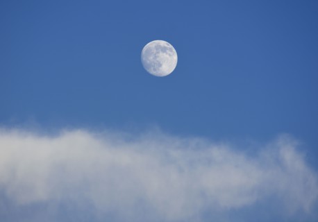 Full moon on blue sky
