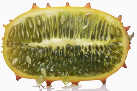 Half of dragonfruit against white background
