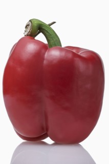 Red pepper against white background