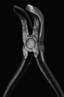 Hand tool against black background