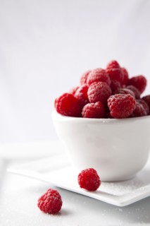 Raspberries in white cup