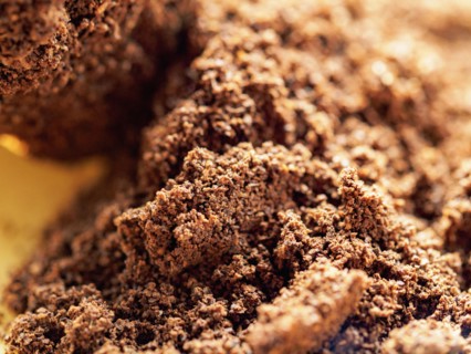 Heap of brown ground coffee