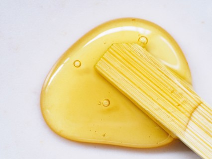 Honey and wooden stick