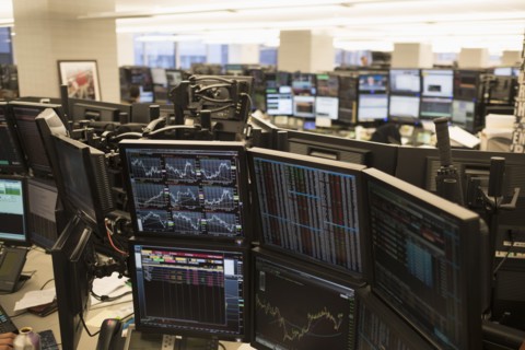 Trading floor with working computers.