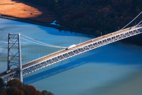 USA, New York, Bear Mountain with bridge above blue river
