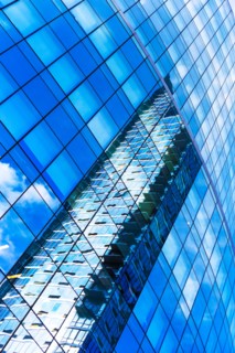 USA, New York, Clouds reflecting in glassy office building