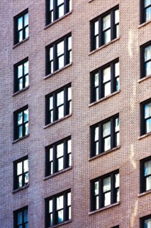 USA, New York, Row of windows in high building