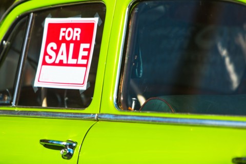 For sale sign on car window