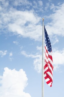 American flag against blue sky