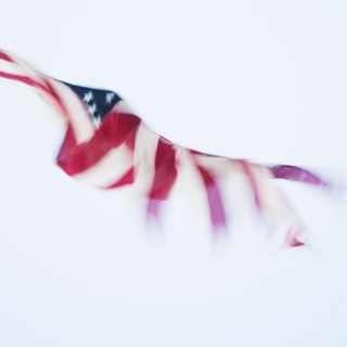 Blurred american flag against white background