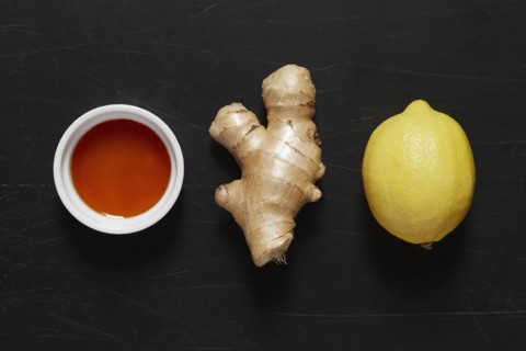 Bowl with honey, ginger and lemon