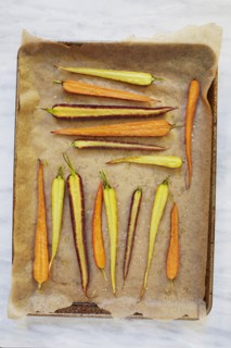 Sliced carrots on baking sheet