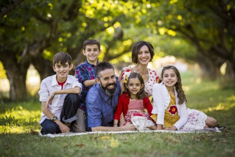 Family sitting and smiling