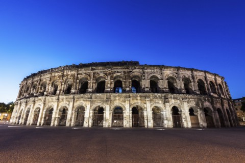 France, Occitanie, Nimes, Arena of Nimes at dusk