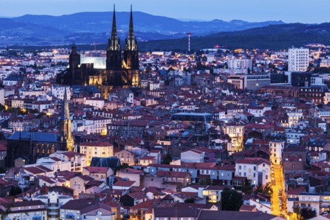 France, Auvergne-Rhone-Alpes, Clermont-Ferrand, Cityscape at dusk