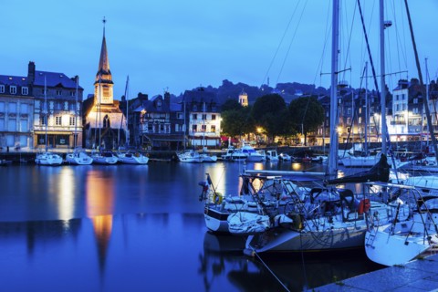 France, Normandy, Honfleur, Boats in harbor and Saint-Etiennei Church in distance