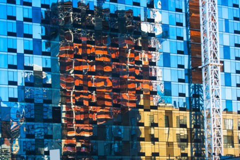 USA, New York State, New York City, Detail of glass facade with reflections