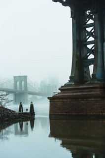 USA, New York, New York City, Manhattan, Brooklyn Bridge over East River in fog