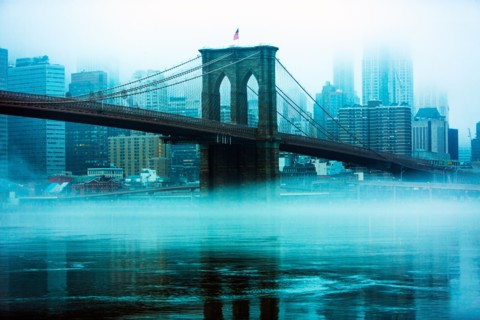 USA, New York, New York City, Manhattan, Brooklyn Bridge over East River in fog