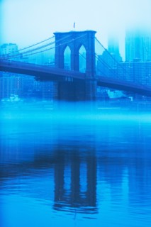 USA, New York, New York City, Manhattan, Brooklyn Bridge over East River in fog
