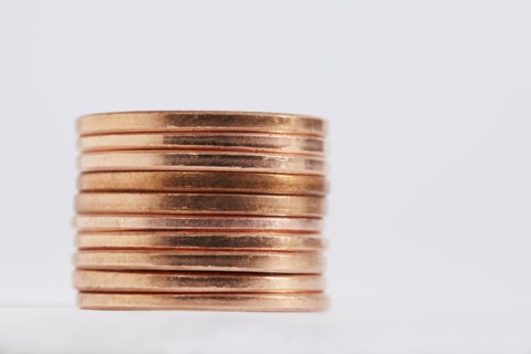 Stack of coins on white background