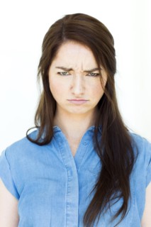 Portrait of woman making sad expression