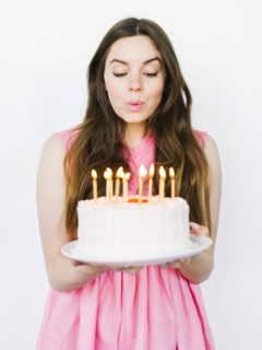 Woman with birthday cake