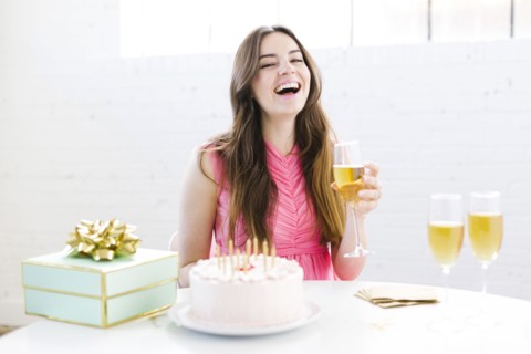 Portrait of woman at birthday party