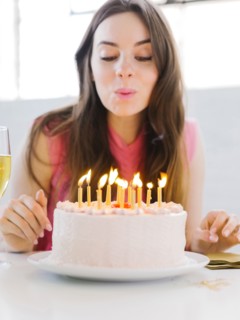 Portrait of woman at birthday party