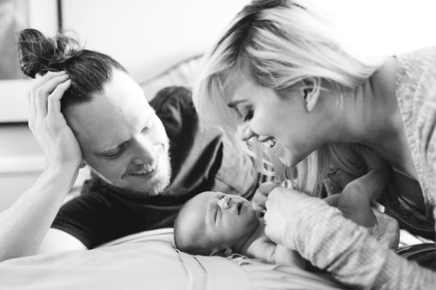 Portrait of parents with newborn boy ( 0-1 months )