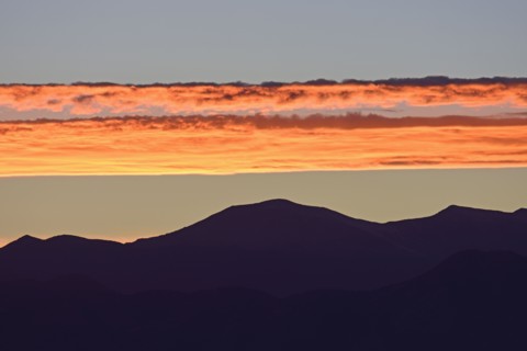 USA, Colorado, Denver, Horizontal clouds over Front Range at sunset