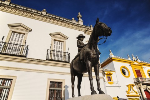Spain, Seville, Equestrian statue of Augusta Senora Condesa de Barcelona in front of Plaza de Toros