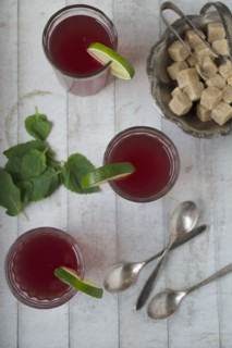Overhead view of fresh tea with lime and mint
