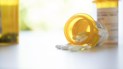 Pill bottles on table