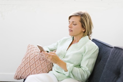 Mature woman using phone