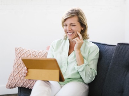 Mature woman using tablet