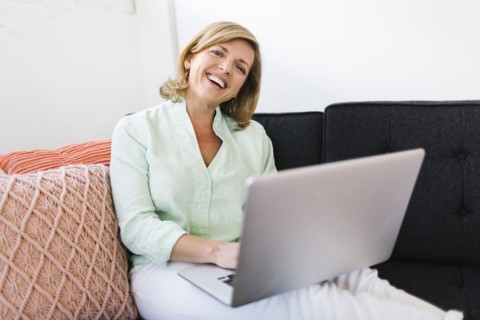 Portrait of Mature woman using computer