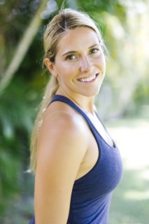 Blonde woman in tank top smiling