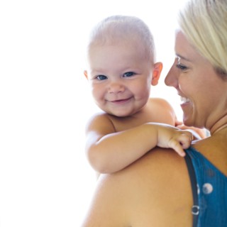 Mother holding baby boy (18-23 months)