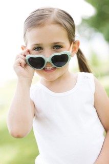 Portrait of girl (4-5) wearing sunglasses