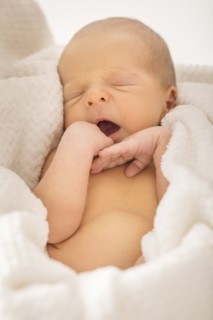 Baby boy (0-1 months) yawning