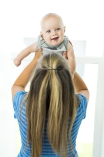 Mother playing with son (6-11 months)
