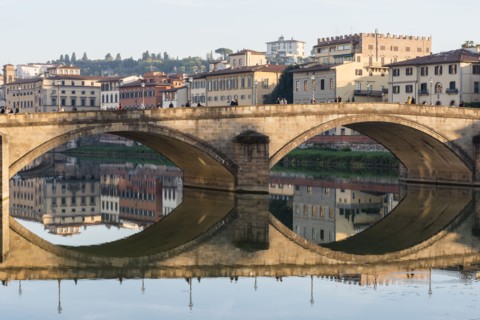 Italy, Tuscany, Florence, Cityscape reflected in Arno river