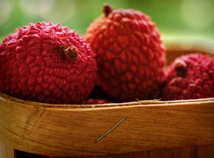 Red lychee in basket