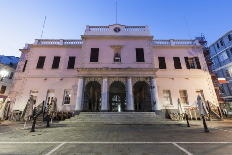 Gibraltar, Gibraltar City, Gibraltar Parliament on John Mackintosh Square at dusk