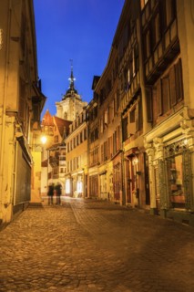 France, Grand Est, Colmar, Incidental people in long exposure with St Martin Church background