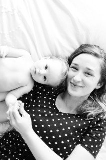 Portrait of baby girl (6-11 Months) with mother, directly above