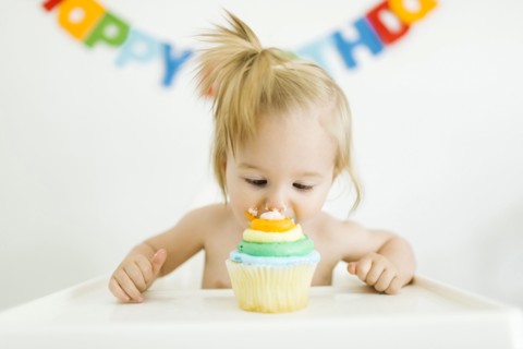 Baby girl (12-17 months) celebrating first birthday