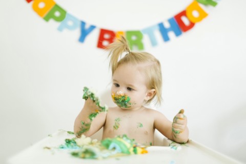 Baby girl (12-17 months) celebrating first birthday