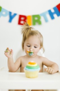 Baby girl (12-17 months) celebrating first birthday